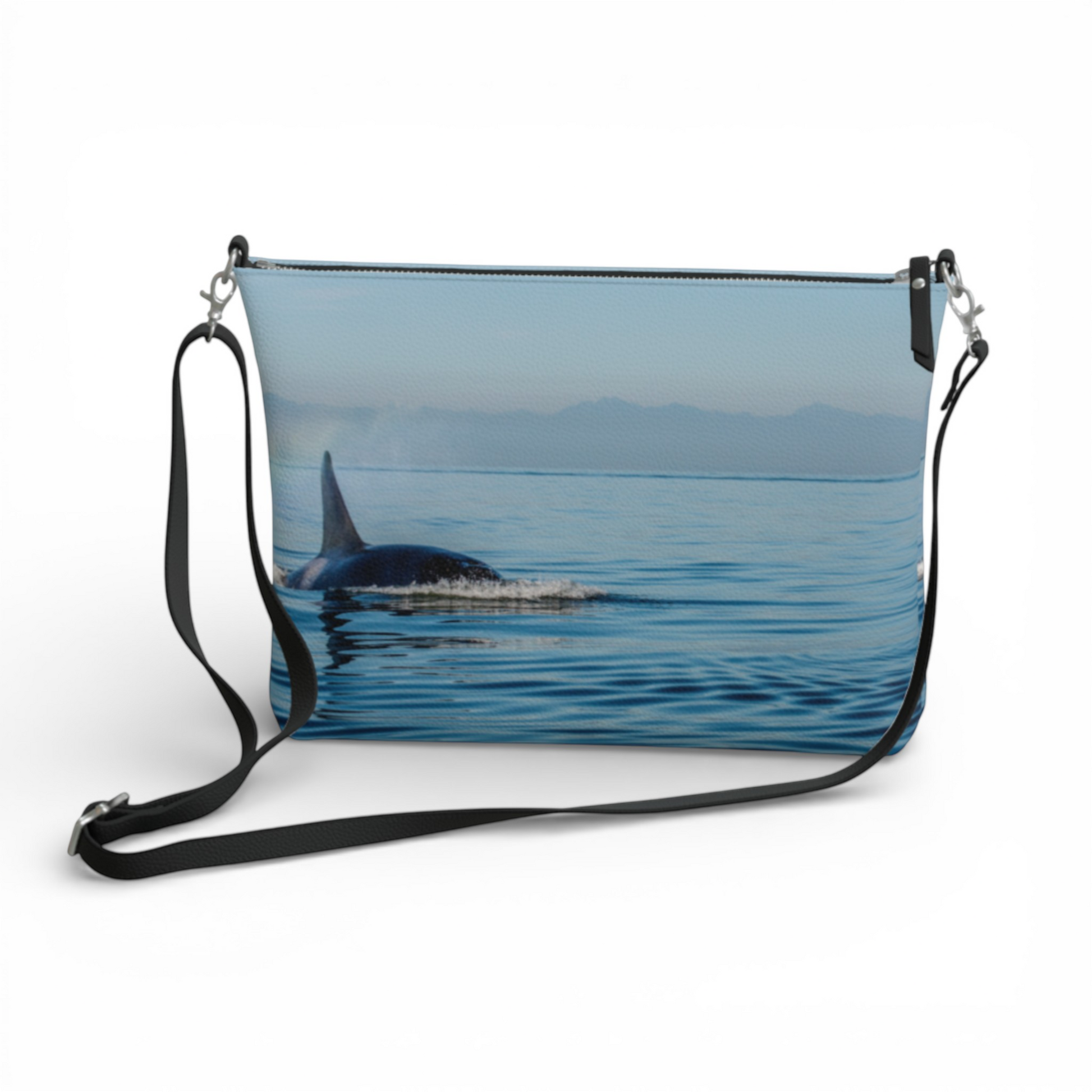 Van Isle Goddess Orca Spray vegan leather crossbody purse with adjustable strap, featuring a killer whale swimming in blue water.