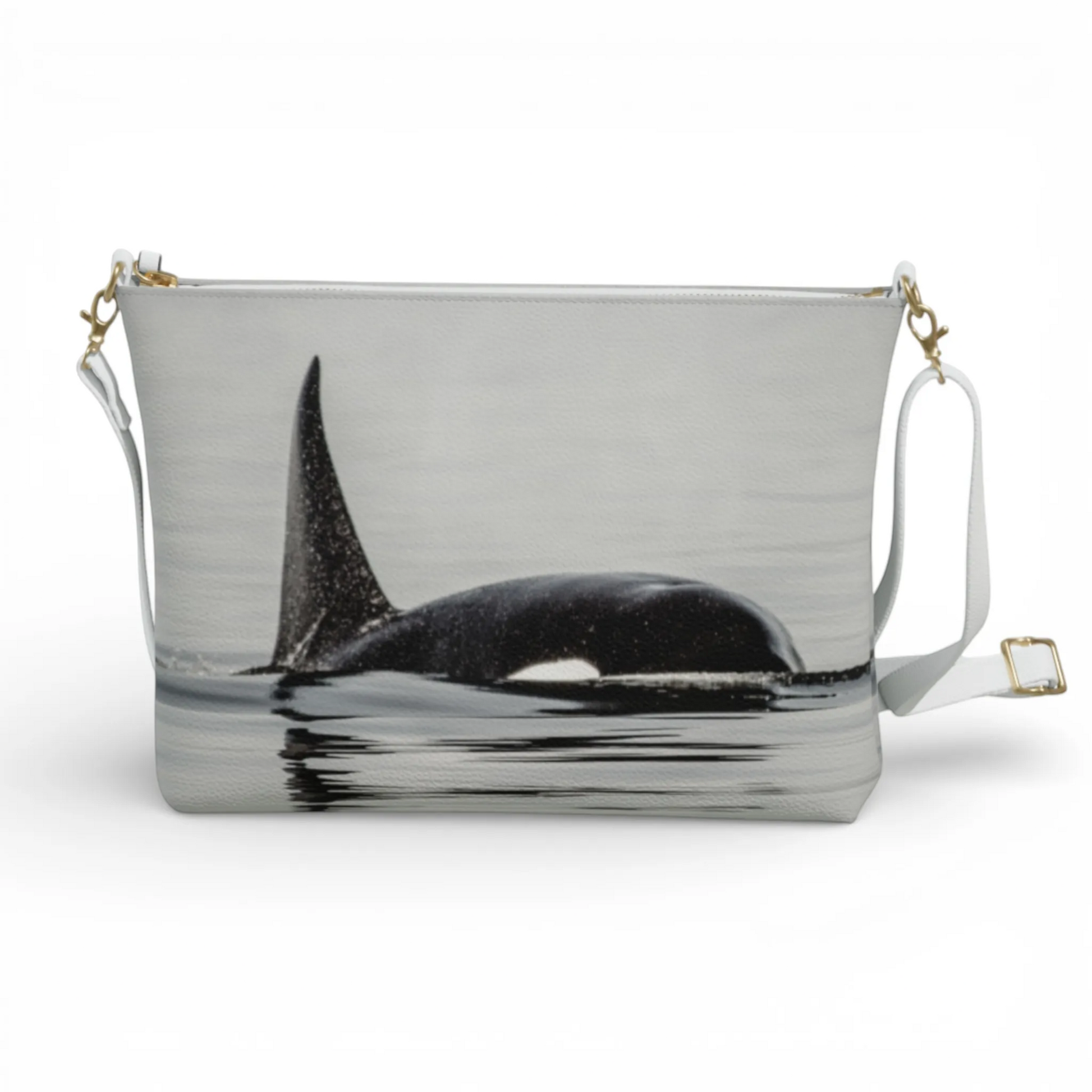 Van Isle Goddess Orca Spray vegan leather crossbody purse with adjustable white strap and gold hardware.