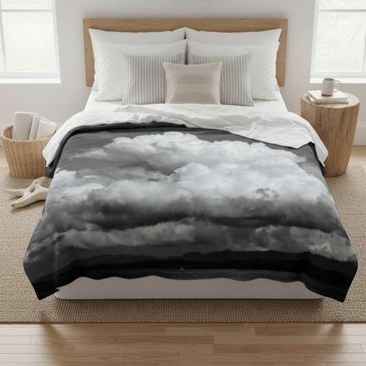 Van Isle Goddess Parksville Beach coastal blanket featuring dramatic clouds over water and mountains. Double-thick minky fabric.