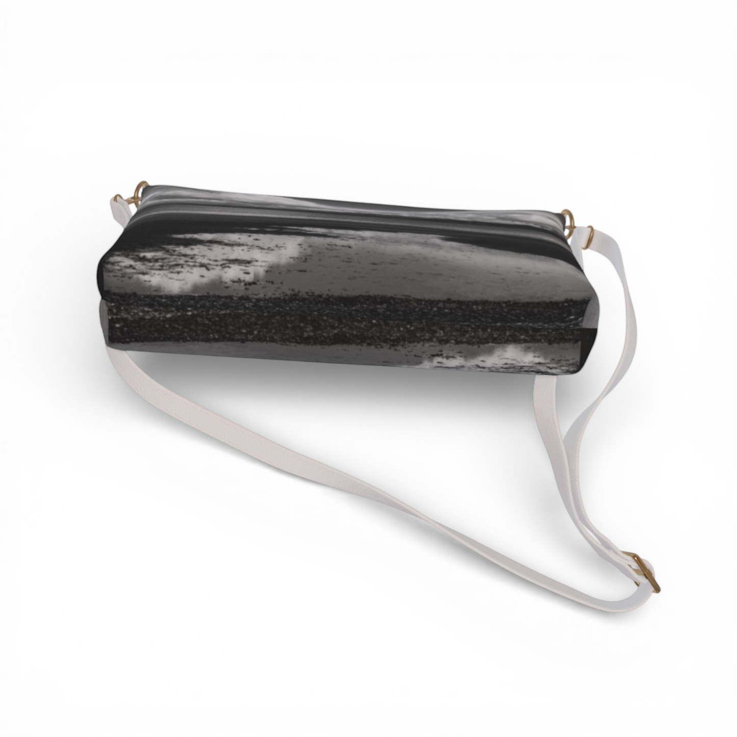 Van Isle Goddess Parksville Beach crossbody purse in black and white abstract print, vegan leather with adjustable white strap.