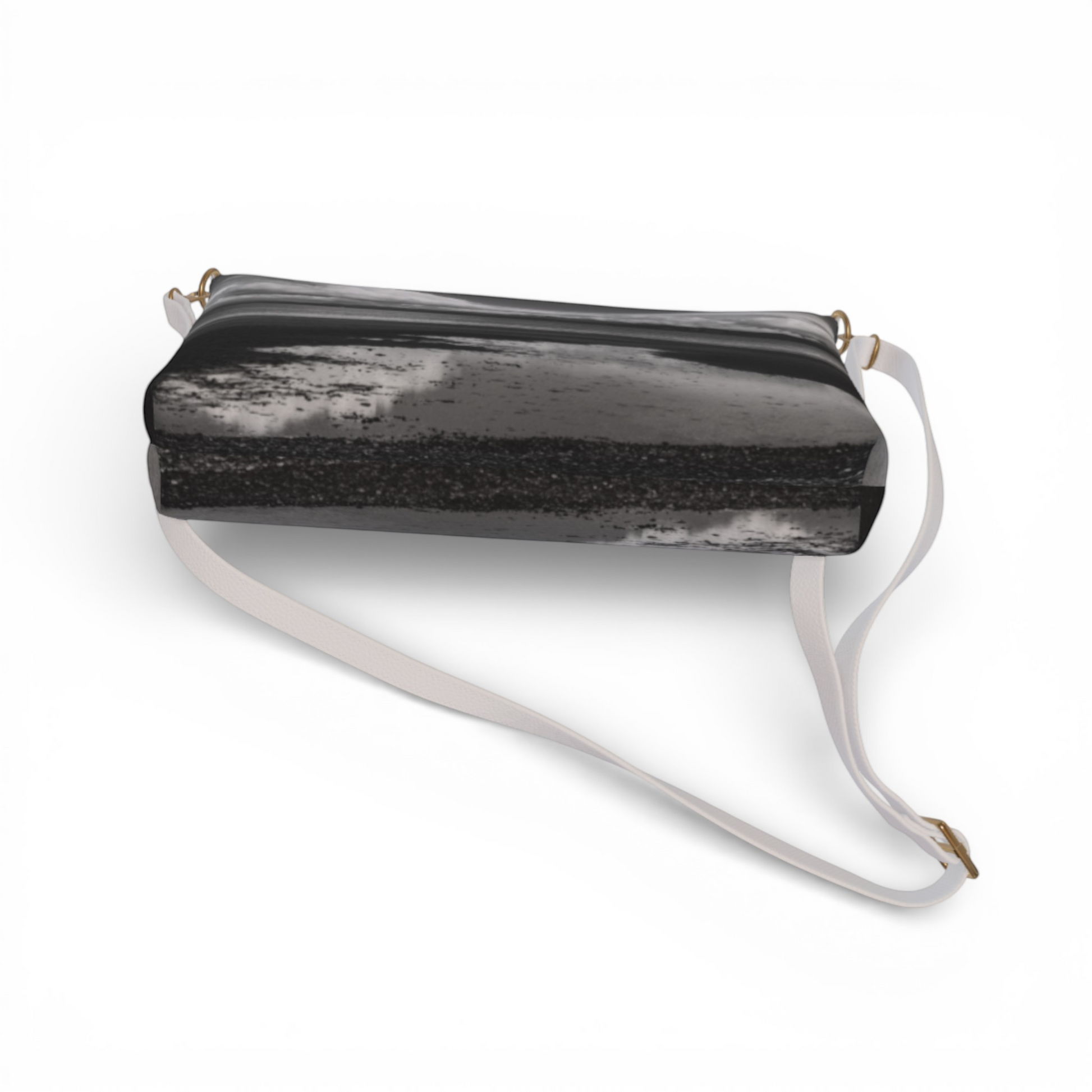 Van Isle Goddess Parksville Beach crossbody purse in black and white abstract print, vegan leather with adjustable white strap.