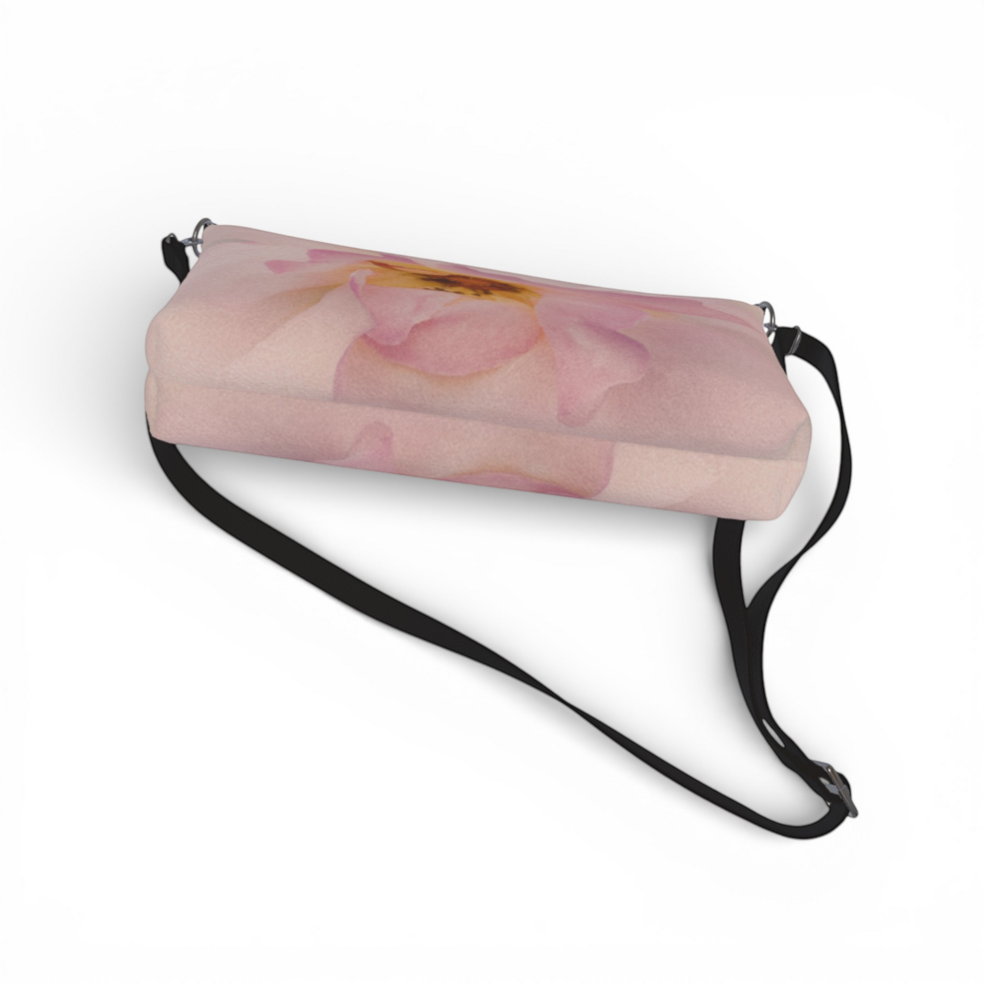 Van Isle Goddess Center of My Universe crossbody purse in light pink vegan leather with a large floral print and adjustable black strap.