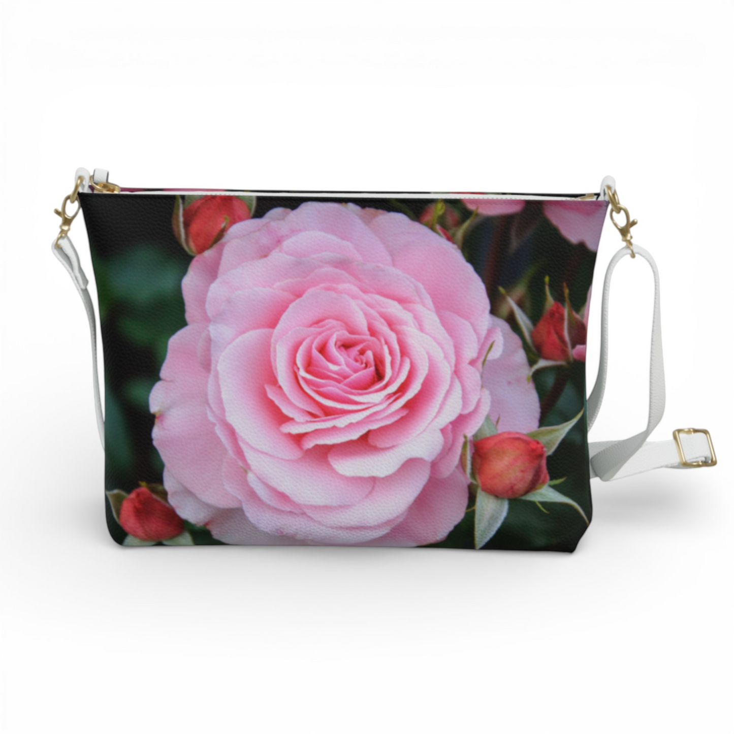 Van Isle Goddess crossbody purse with a large pink rose and red rosebuds print, white strap, vegan leather.