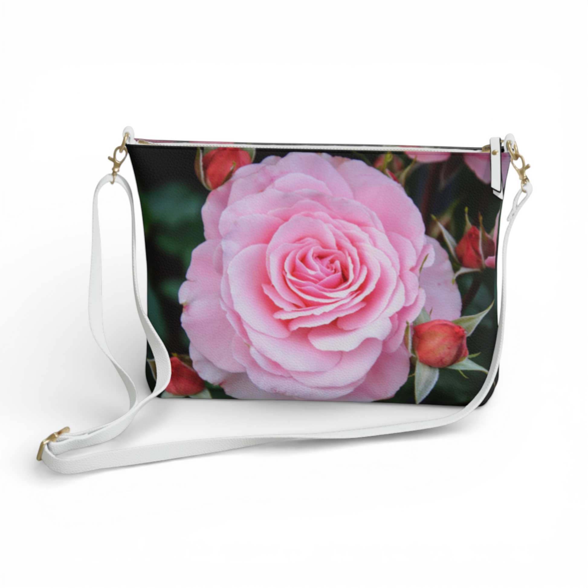 Van Isle Goddess pink rose floral vegan leather crossbody purse with white strap and gold hardware.