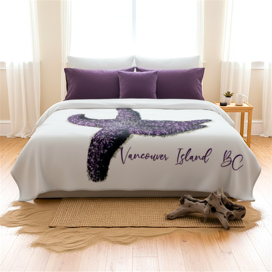 Van Isle Goddess purple starfish blanket with Vancouver Island BC text, made of soft minky fabric.