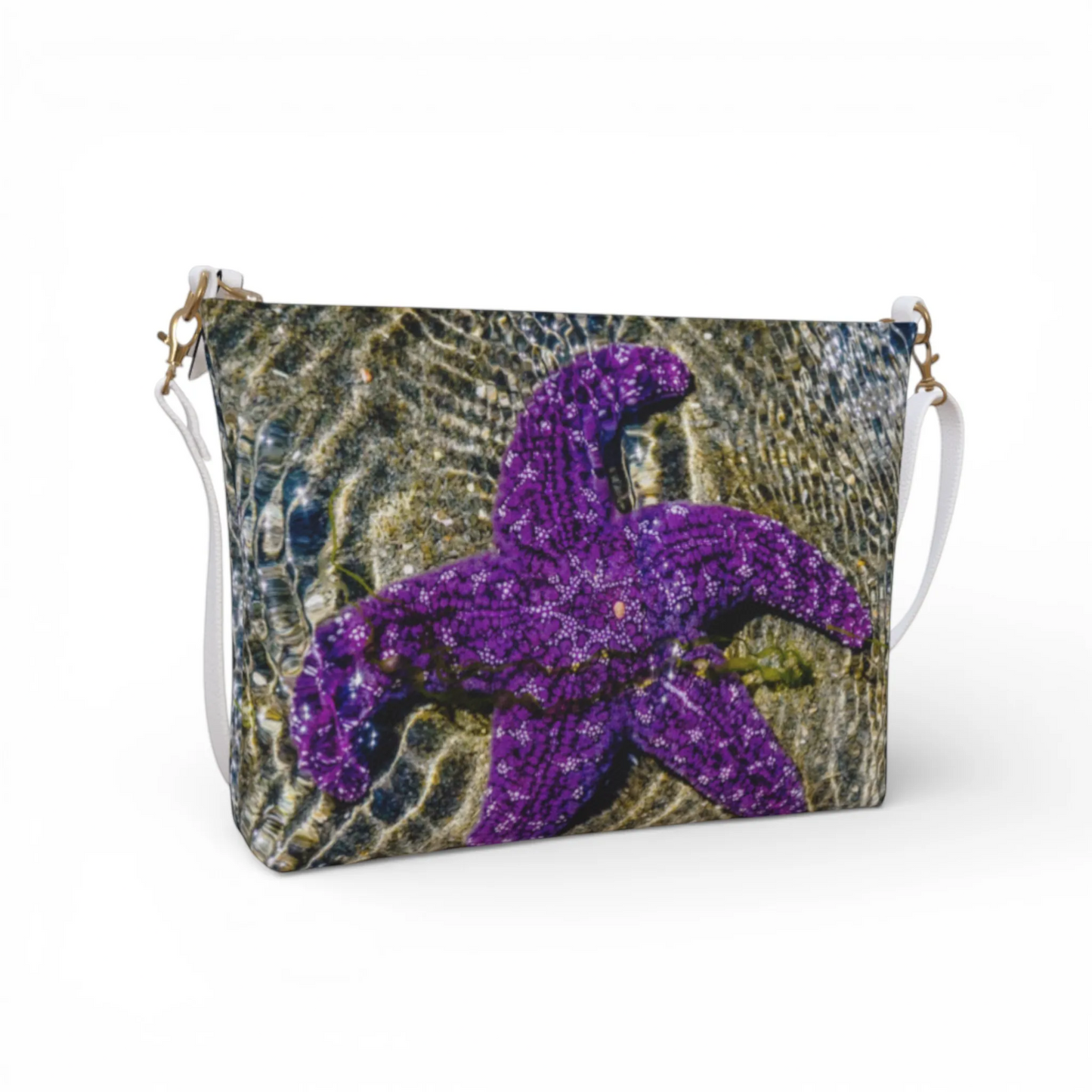 Van Isle Goddess purple starfish vegan leather crossbody purse with adjustable strap.