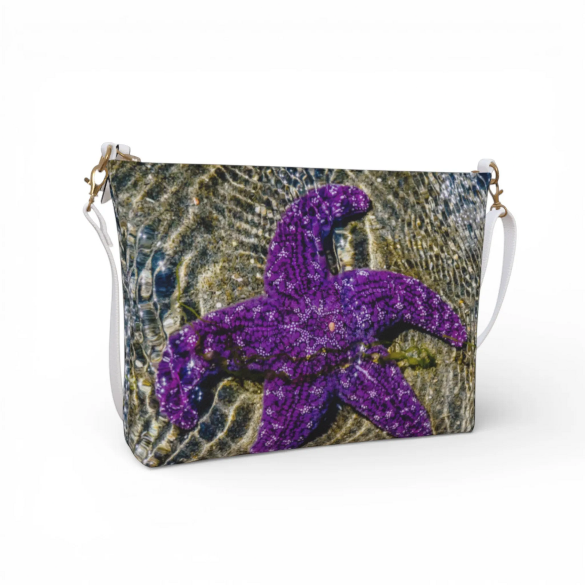 Van Isle Goddess purple starfish vegan leather crossbody purse with adjustable strap.