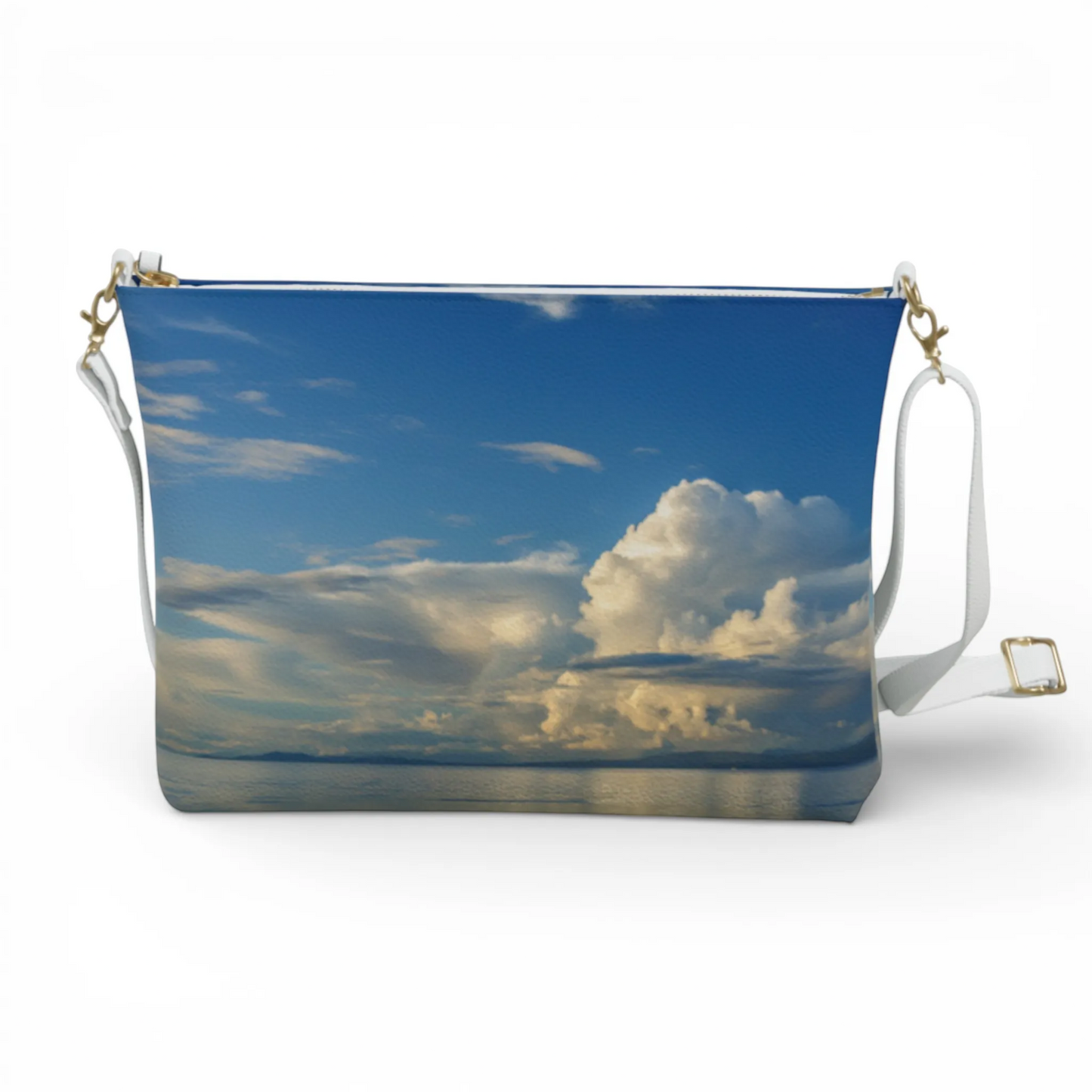 Van Isle Goddess Qualicum Beach crossbody purse, vegan pebble leather with adjustable strap and cloudscape print.