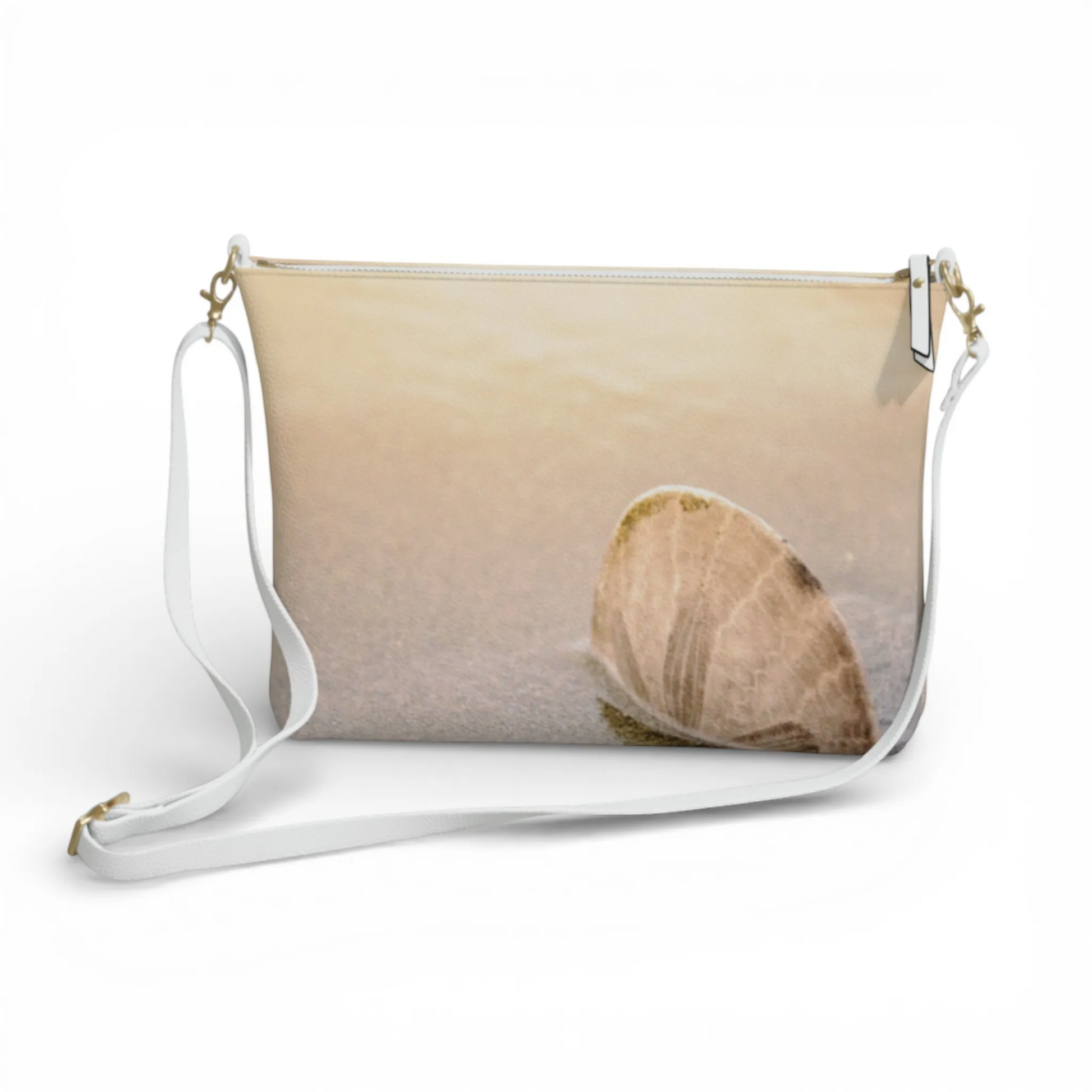 Van Isle Goddess sand dollar vegan leather crossbody purse with adjustable white strap and gold hardware.