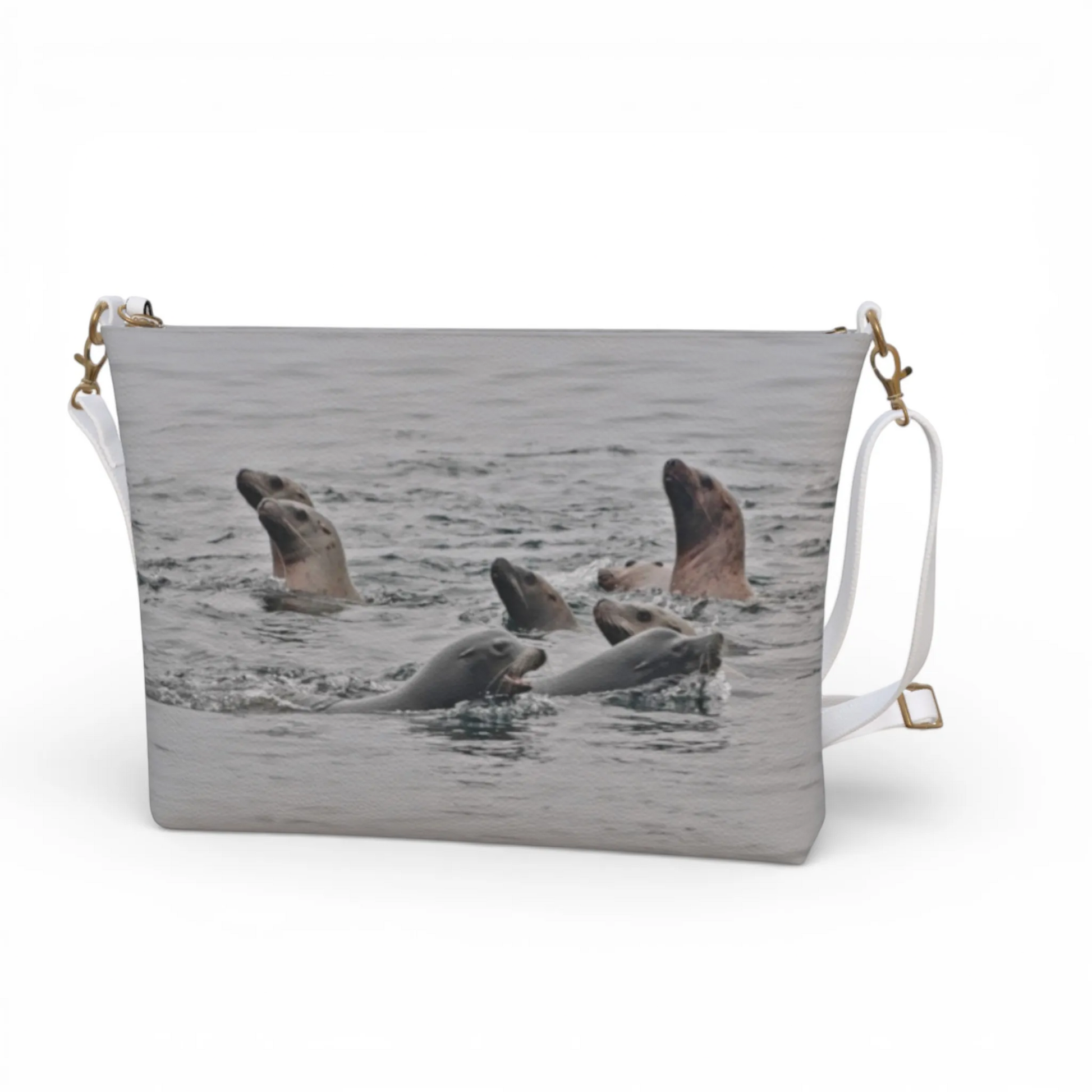 Van Isle Goddess Sea Lions vegan leather crossbody purse with adjustable strap and metal hardware.