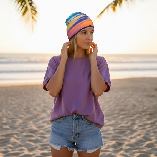 Van Isle Goddess Soul Therapy Beanie with a vibrant sunset stripe pattern, made from polyester and spandex with a bamboo lining.