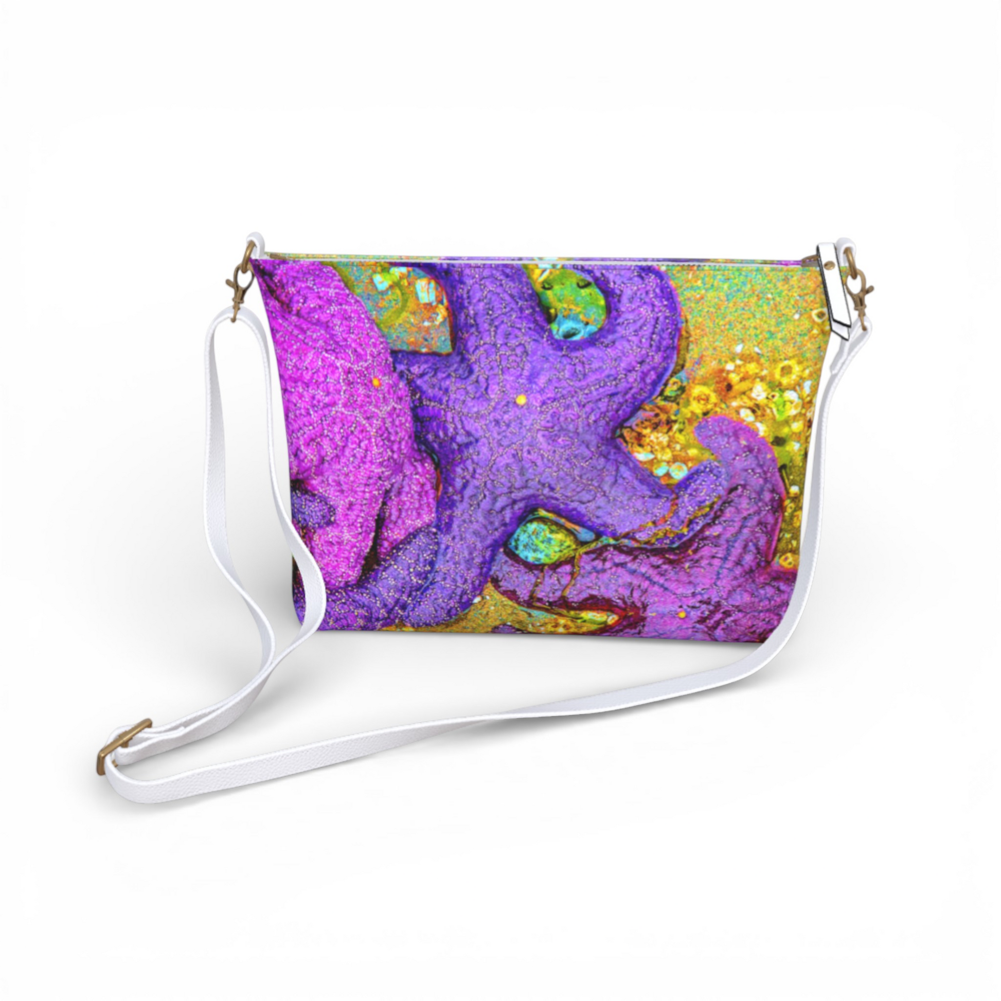 Van Isle Goddess crossbody purse with purple starfish print on vegan leather, adjustable white strap, and metal hardware.