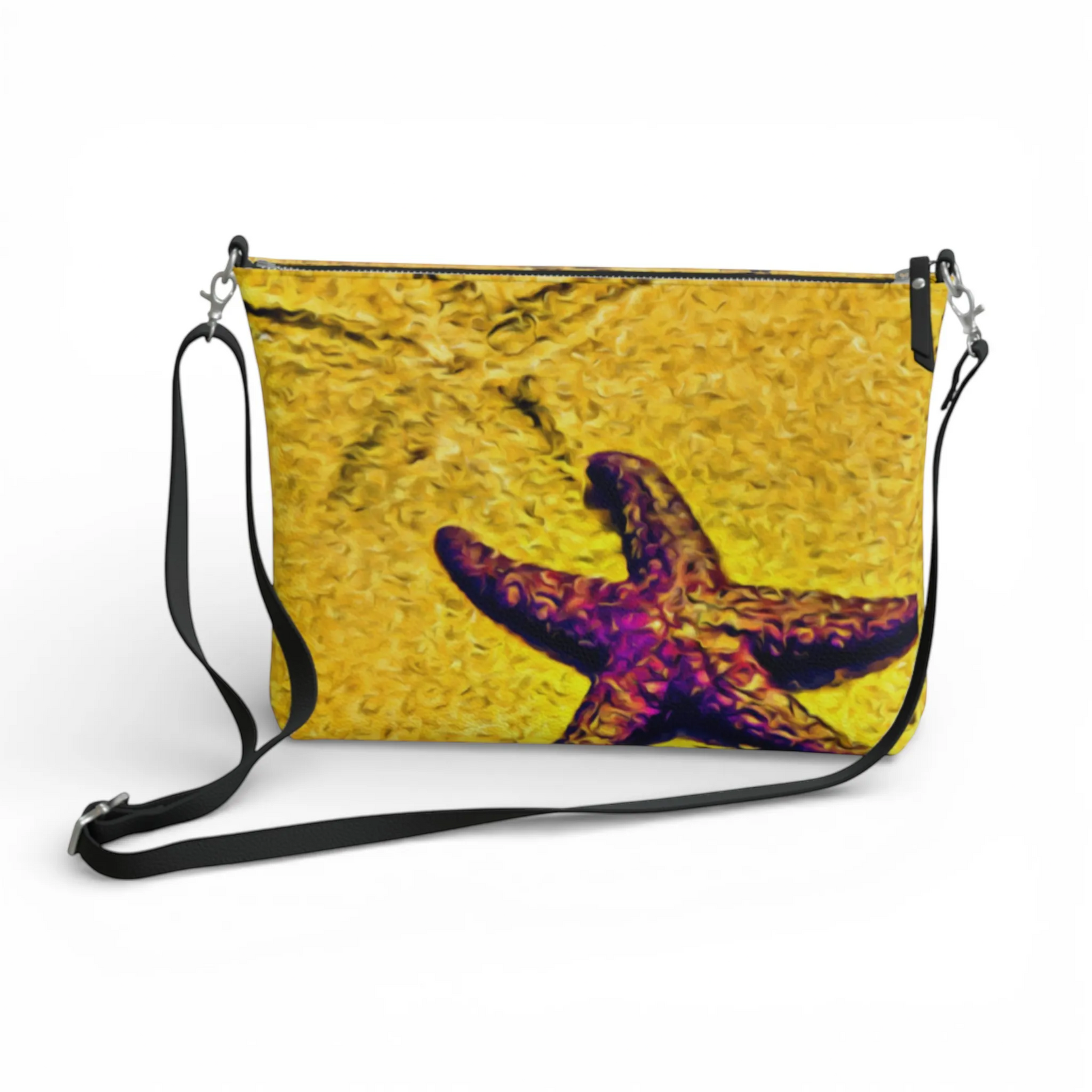 Van Isle Goddess Star Track crossbody purse in vegan leather with a starfish print and adjustable strap.