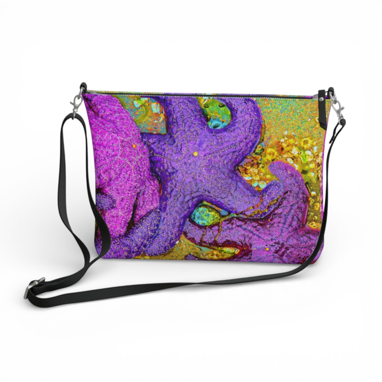 Van Isle Goddess crossbody purse with purple starfish print on vegan leather, adjustable strap.