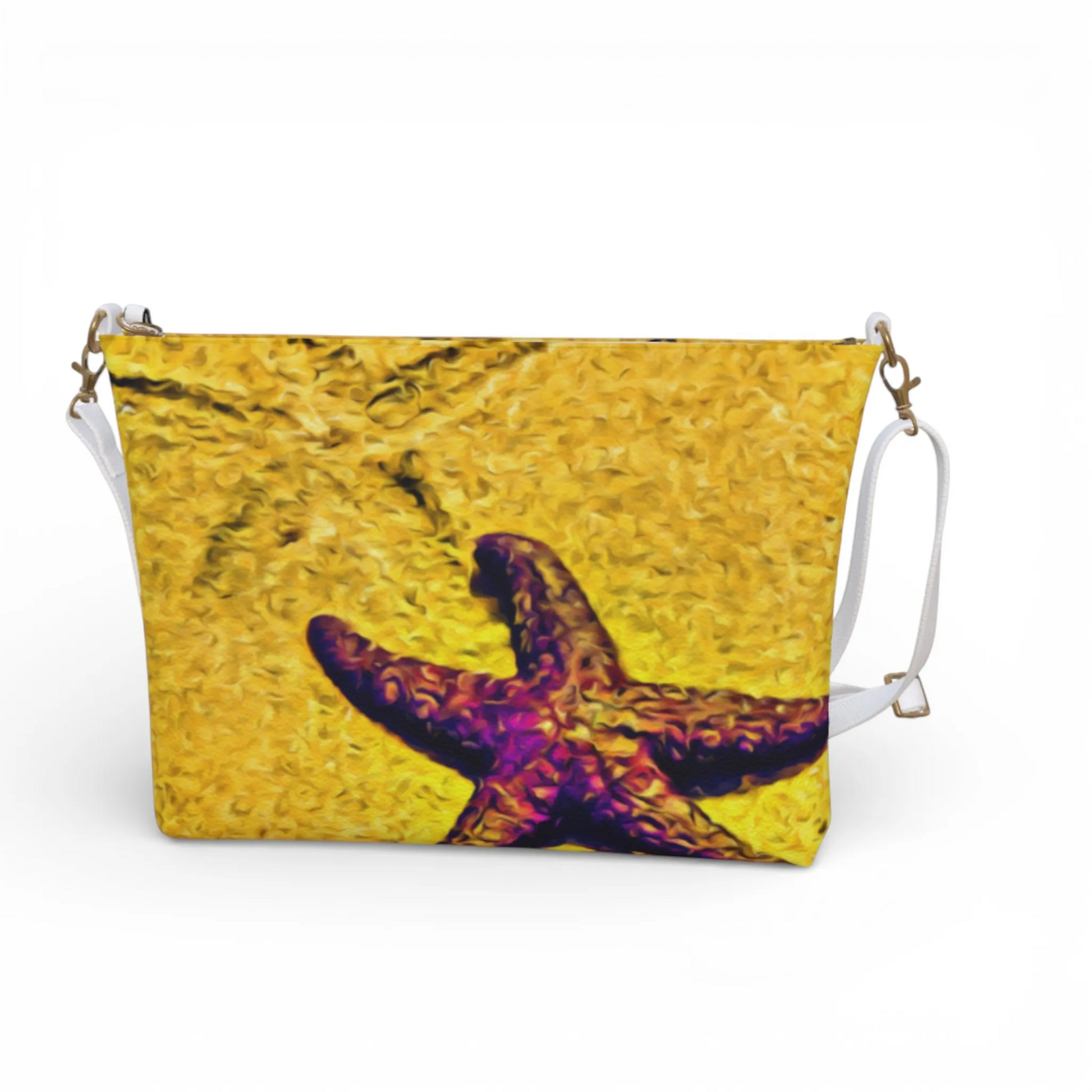 Van Isle Goddess Star Track crossbody purse in vegan leather with a purple starfish on a yellow textured background. Features adjustable strap.