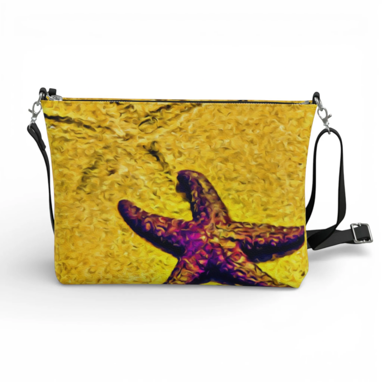Van Isle Goddess Star Track crossbody purse in vegan leather with a starfish print on a yellow textured background. Features adjustable strap.