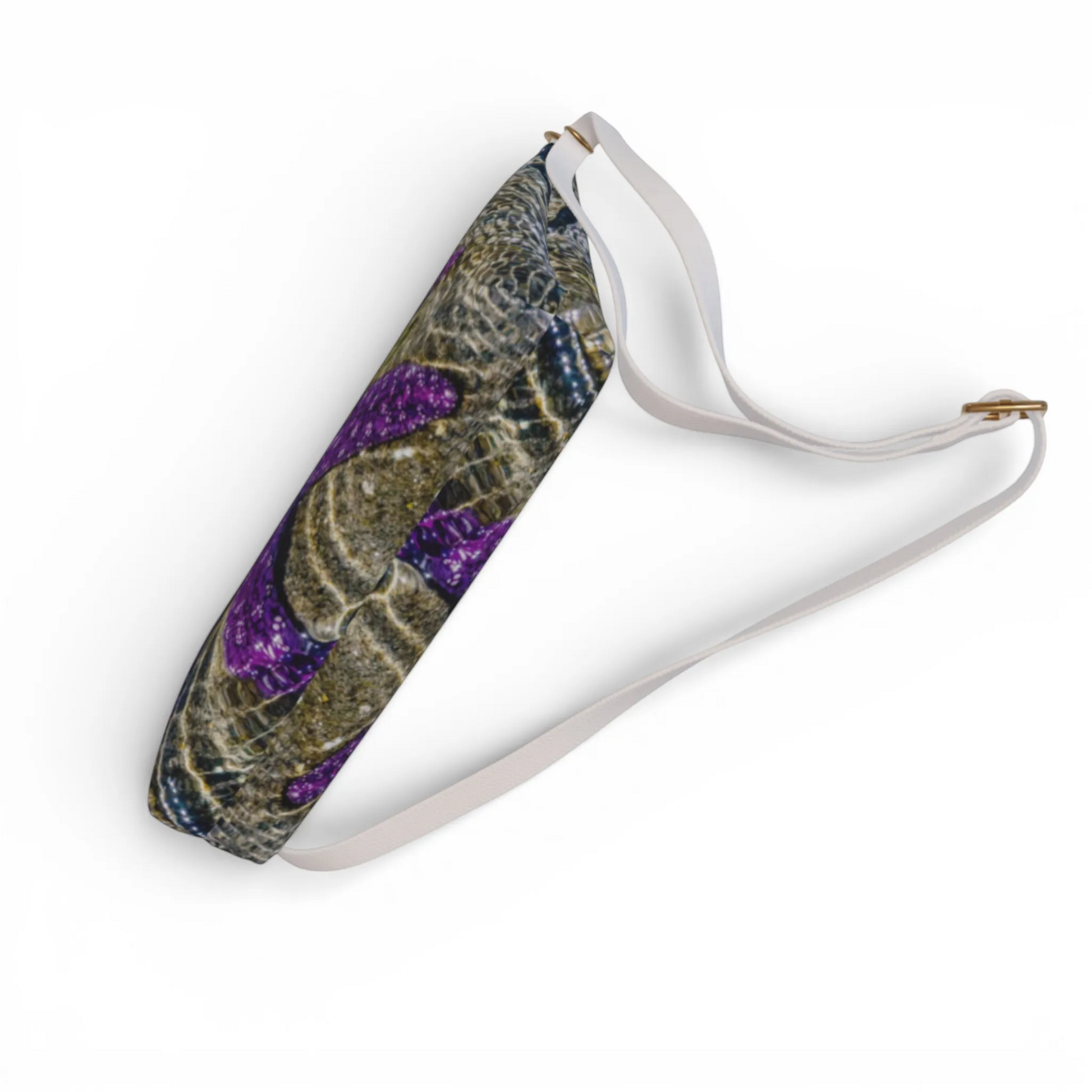 Van Isle Goddess starfish vegan leather crossbody purse with adjustable strap and gold hardware. Features a pebble texture and purple starfish print.