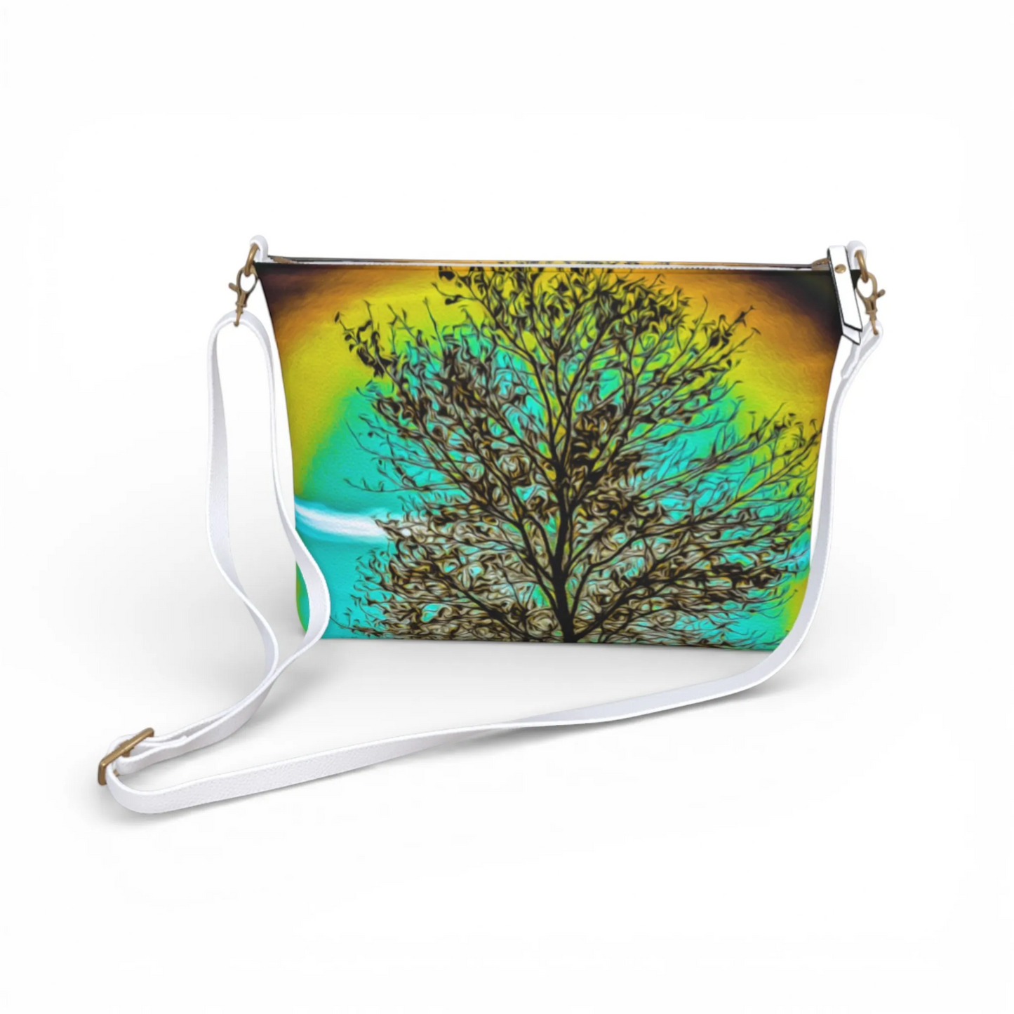 Van Isle Goddess crossbody purse with a Tree of Life print in vibrant yellow, green, and blue. Vegan leather with adjustable strap.