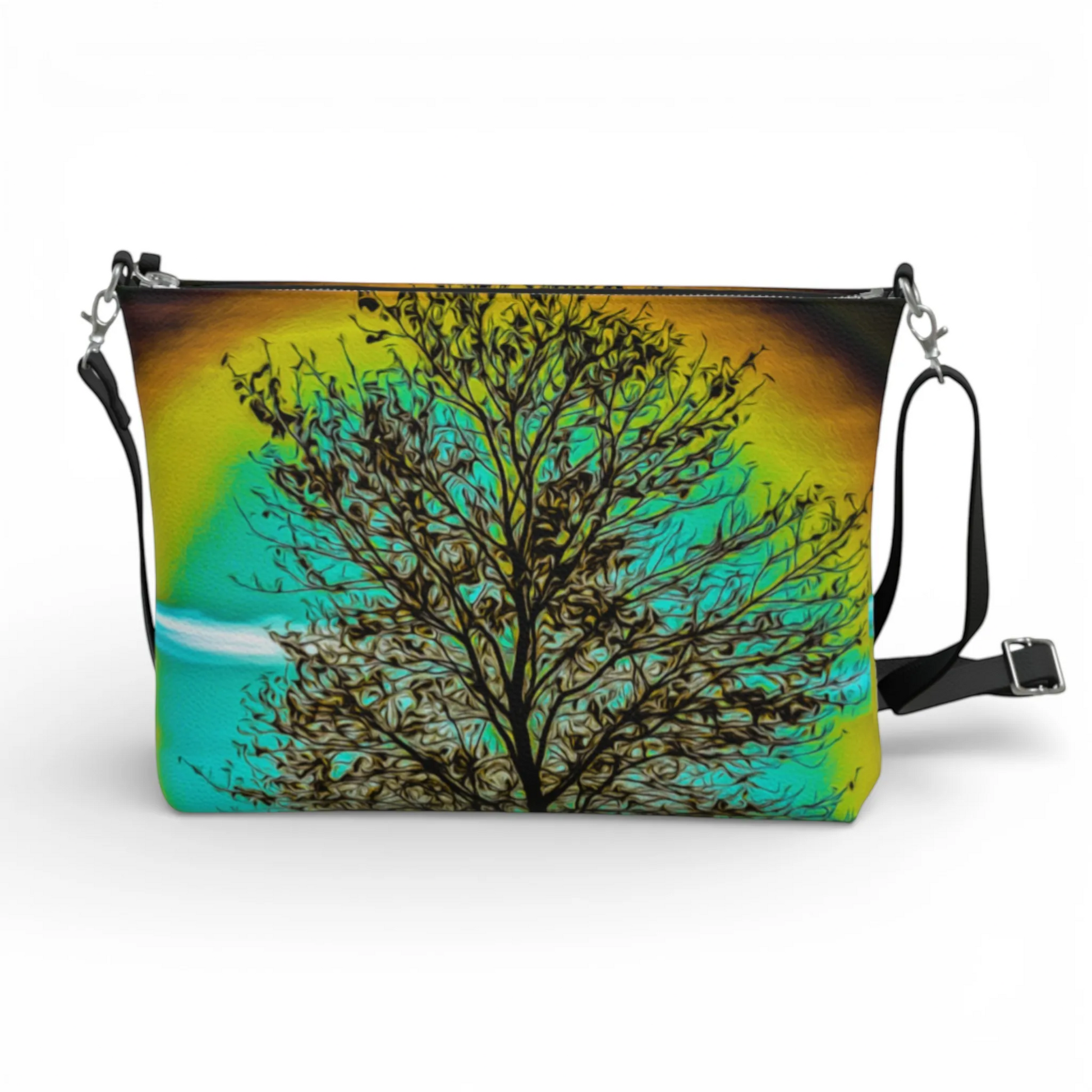 Van Isle Goddess crossbody purse with a Tree of Life print in vibrant yellow, teal, and brown, made of vegan leather with an adjustable strap.