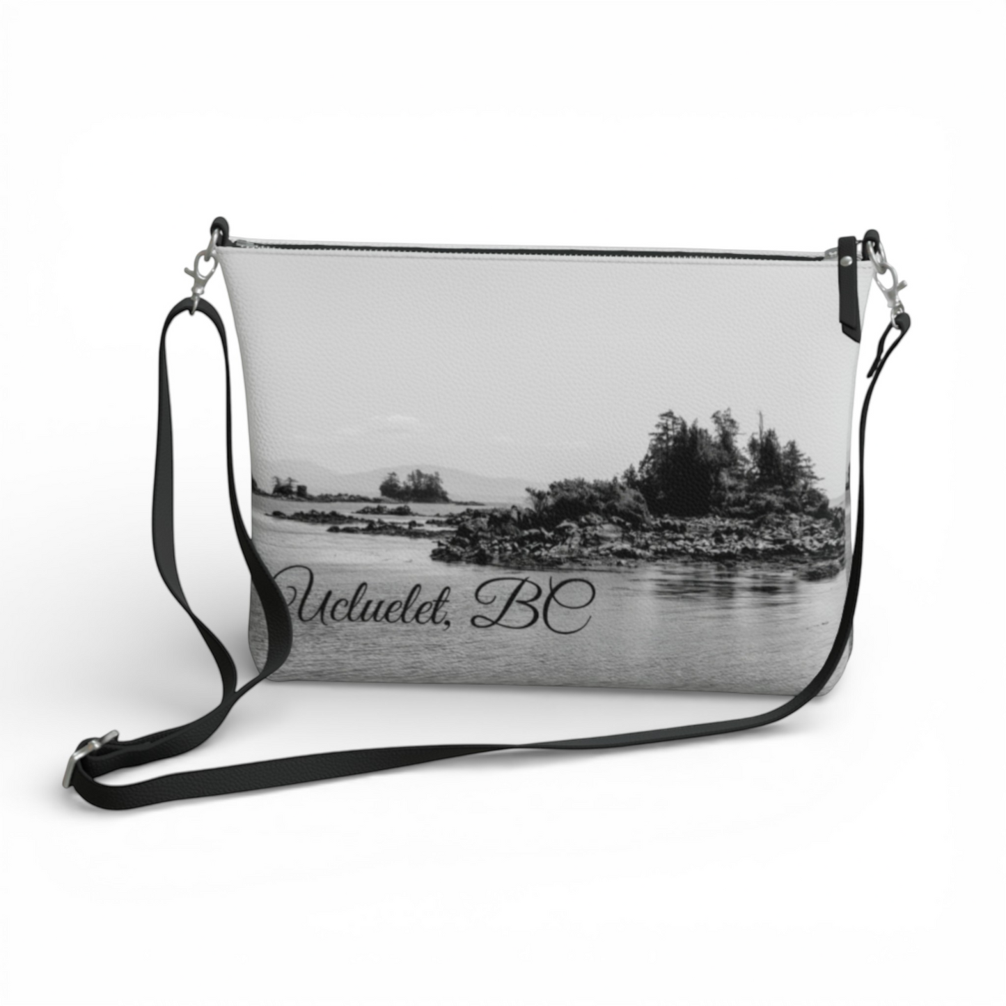 Van Isle Goddess Ucluelet crossbody purse in vegan leather with a black and white landscape print and adjustable strap.