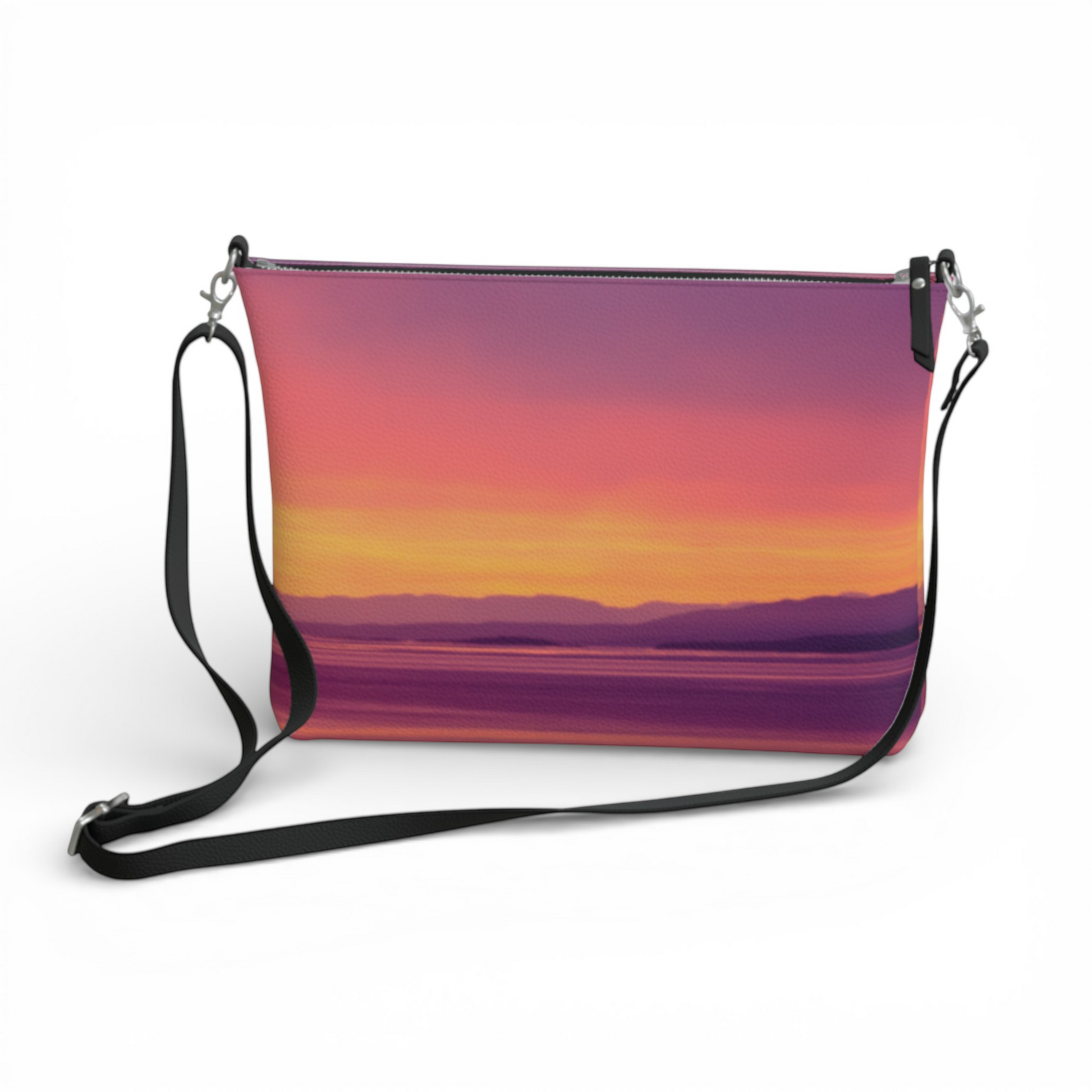 Van Isle Goddess Vancouver Island Sunset vegan leather crossbody purse with adjustable strap and metal hardware.