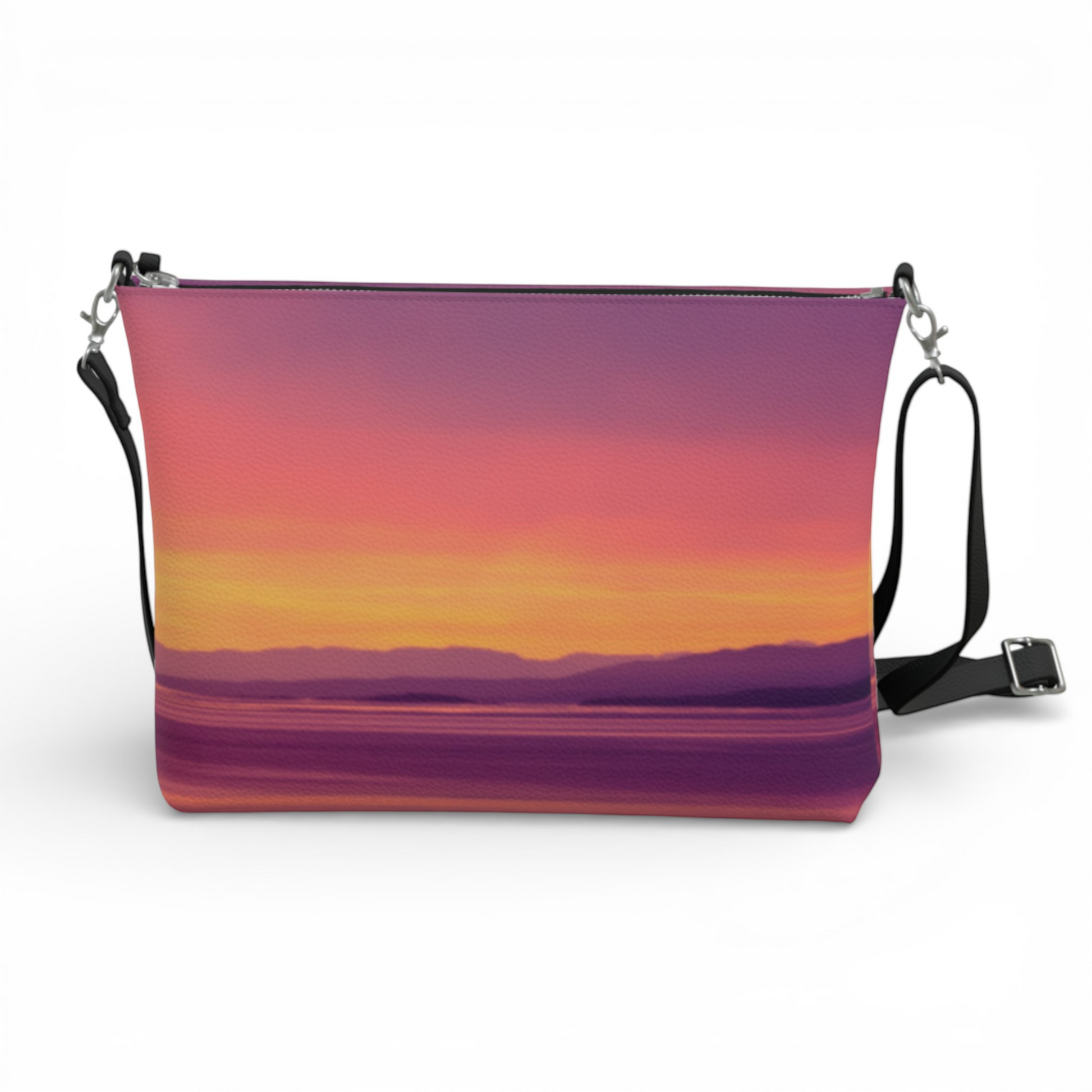 Van Isle Goddess Vancouver Island Sunset vegan leather crossbody purse with adjustable strap and metal hardware.