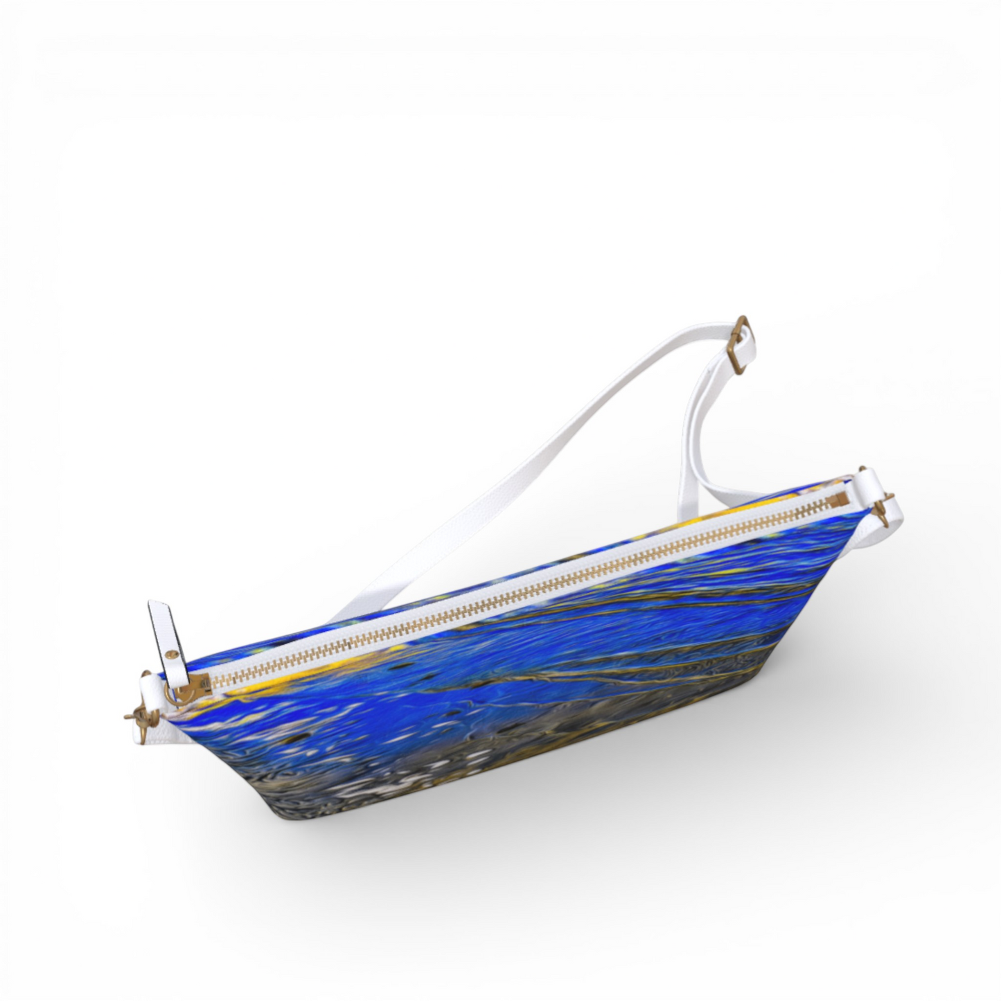 Van Isle Goddess Ebb & Flow vegan leather crossbody purse with abstract blue and gold print, white strap, and gold zipper.
