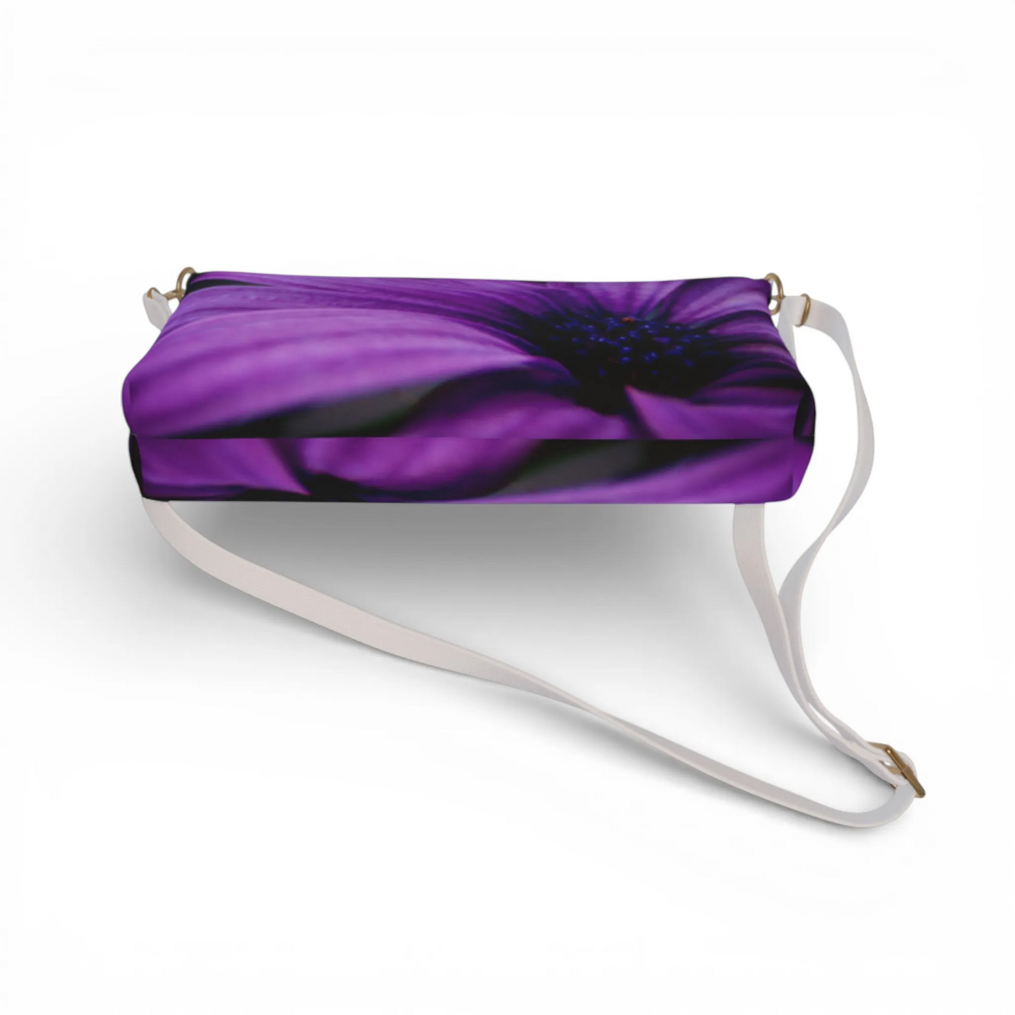 Van Isle Goddess violet vegan leather crossbody purse with adjustable white strap and floral print.