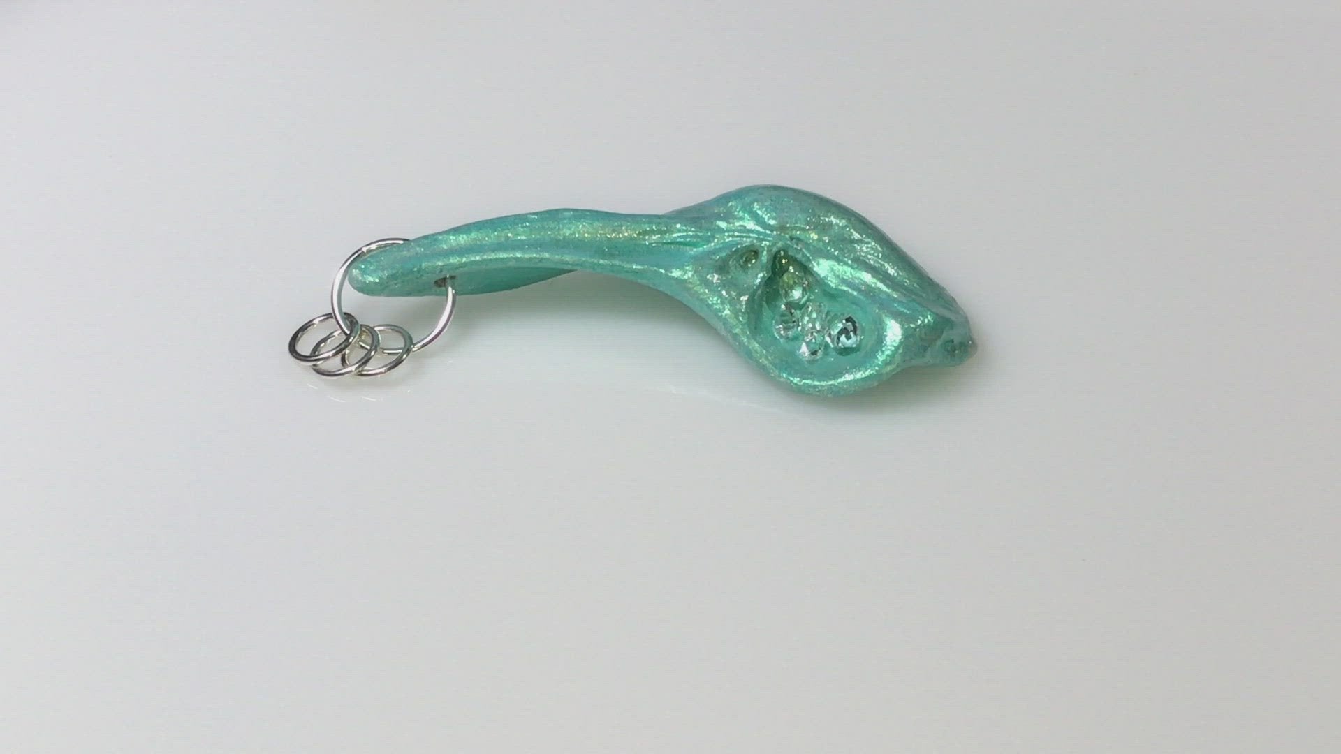 This video showcases The Cascadia Pendant created with a natural seashell from the beaches of Vancouver Island.  The seashell is turquoise and has high quality herkimer diamonds.