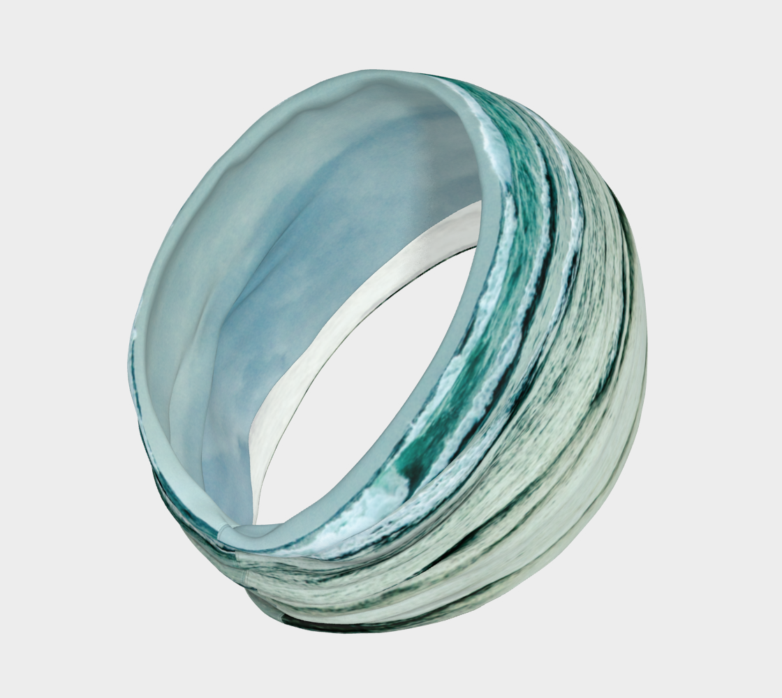 ocean calling is a headband and or neck gaiter with an image of the ocean waves at long beach in tofino