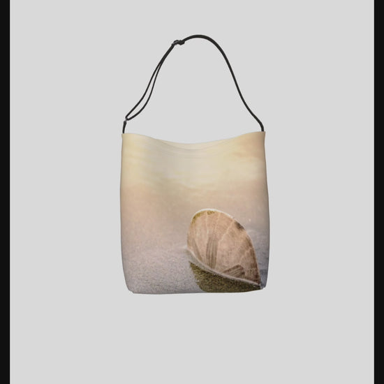Video Standing in the Glow Sand Dollar Neoprene Day Tote: Radiant Coastal-Inspired Tote Bag