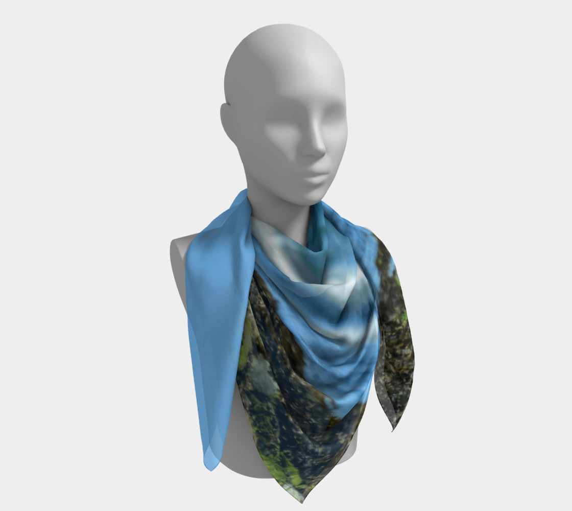 50" Fly Like An Eagle Square Scarf  worn around the neck.