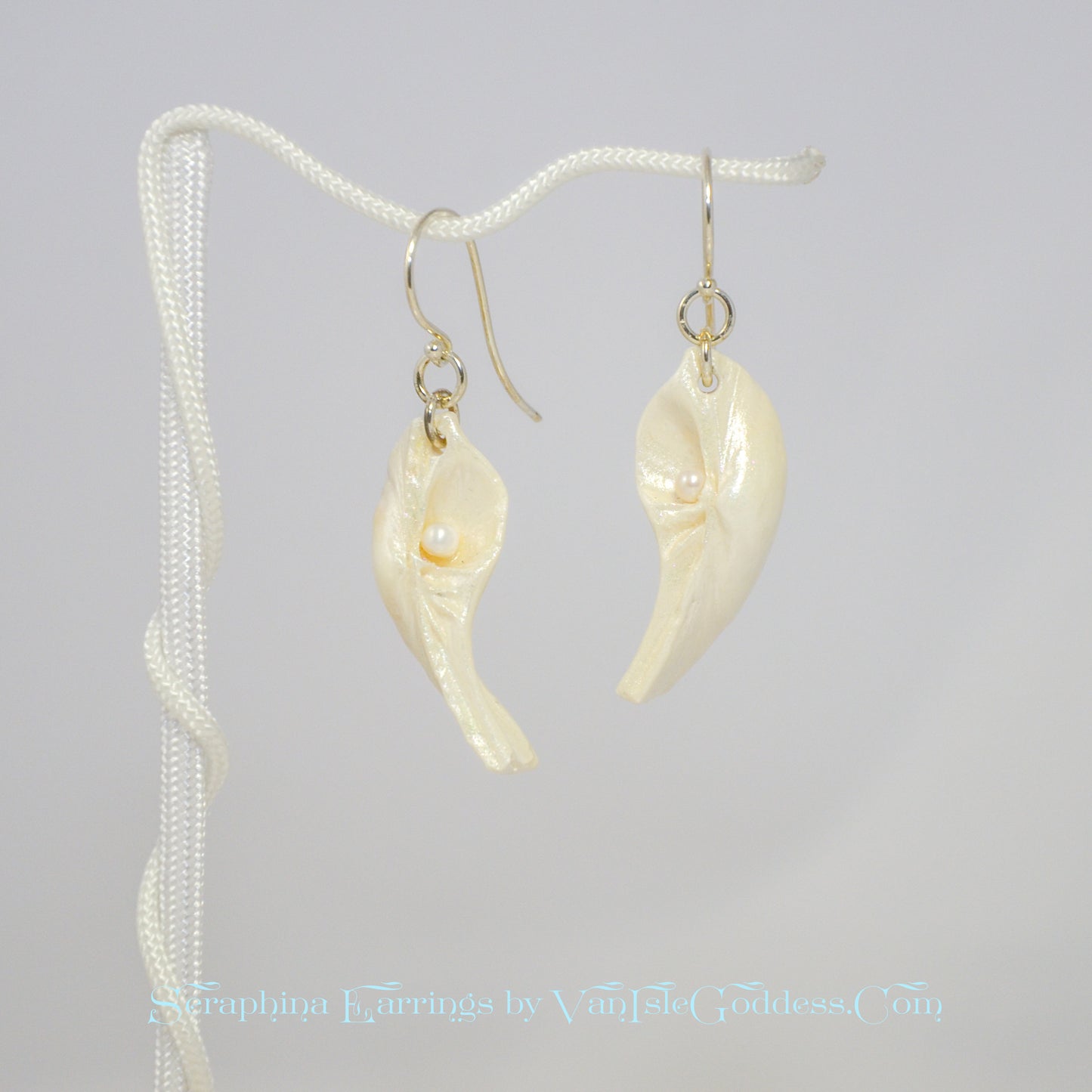 Seraphina natural seashell earrings with real baby freshwater pearls. 