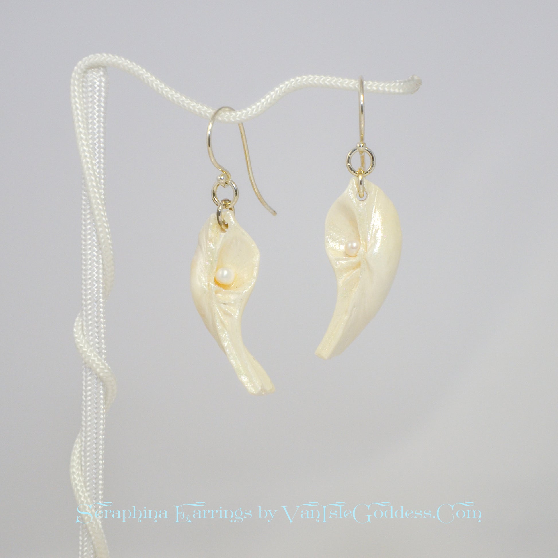 Seraphina natural seashell earrings with real baby freshwater pearls. 