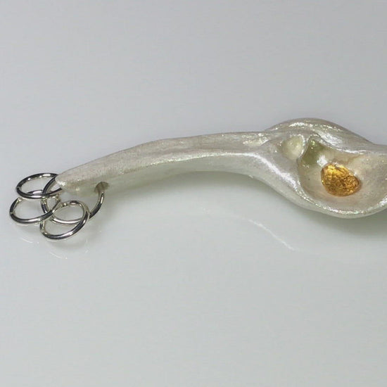 A video showcasing Sun Star natural seashell pendant with a beautiful pear shaped rose cut Citrine.