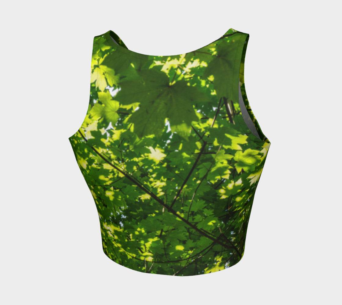 Canopy of Leaves  Athletic Crop Top  Canopy of Leaves artwork by Roxy Hurtubise  Made to move with you!  Wear for your daily workouts, yoga, beach volleyball or as a bathing suit top!  Your Van Isle Goddess athletic crop top pairs up with our yoga or classic leggings and capris. Crop tops also look great with shorts, mini shorts, skirts fitted or flared.