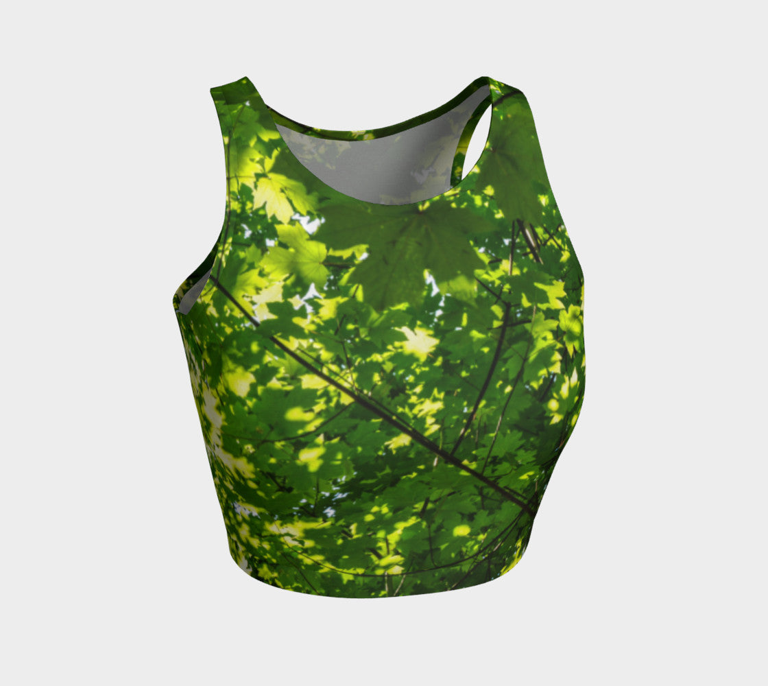 Canopy of Leaves  Athletic Crop Top  Canopy of Leaves artwork by Roxy Hurtubise  Made to move with you!  Wear for your daily workouts, yoga, beach volleyball or as a bathing suit top!  Your Van Isle Goddess athletic crop top pairs up with our yoga or classic leggings and capris. Crop tops also look great with shorts, mini shorts, skirts fitted or flared.