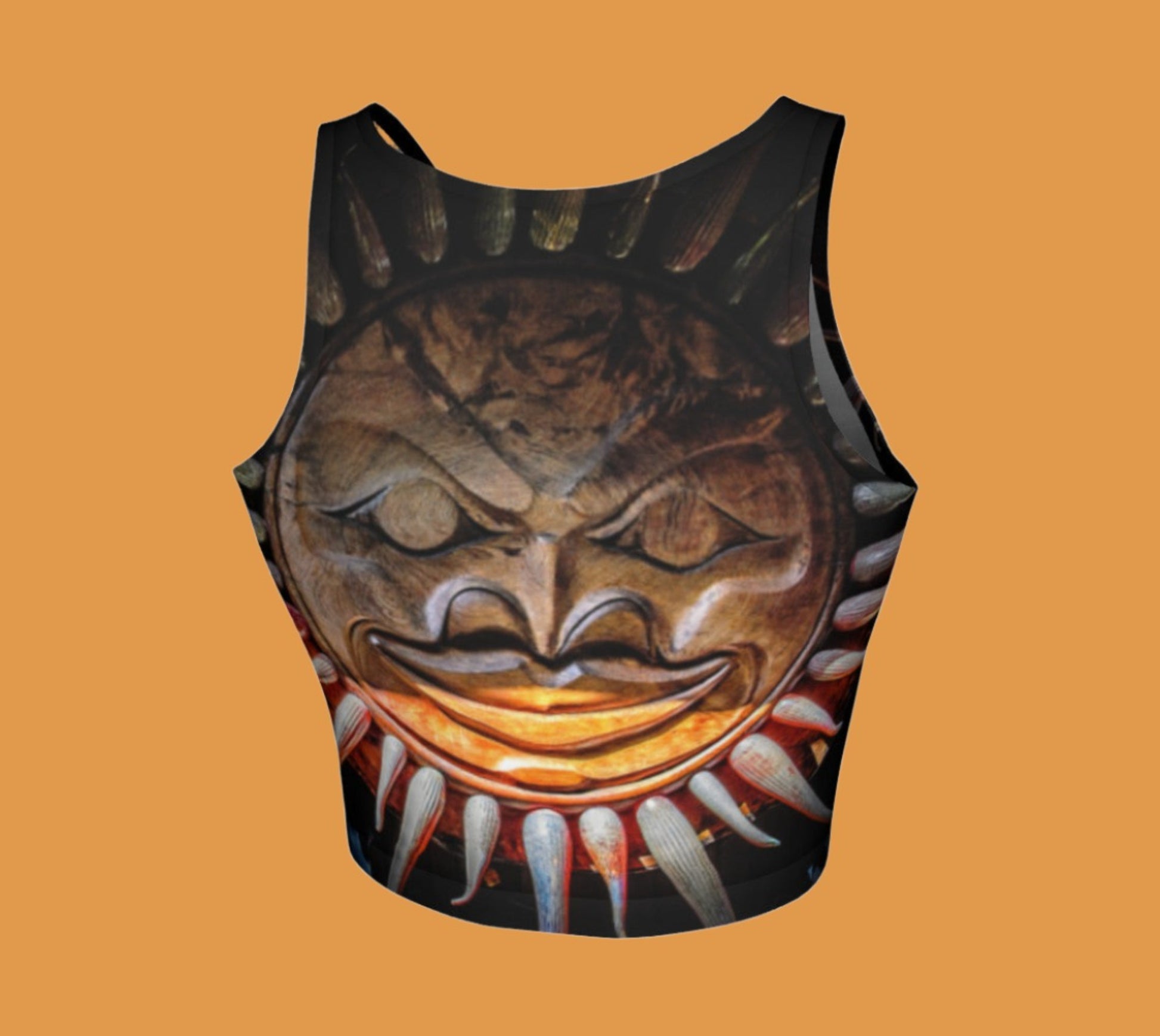 Sun Mask Active Crop Top  Sun mask carving photography is printed on the crop top.