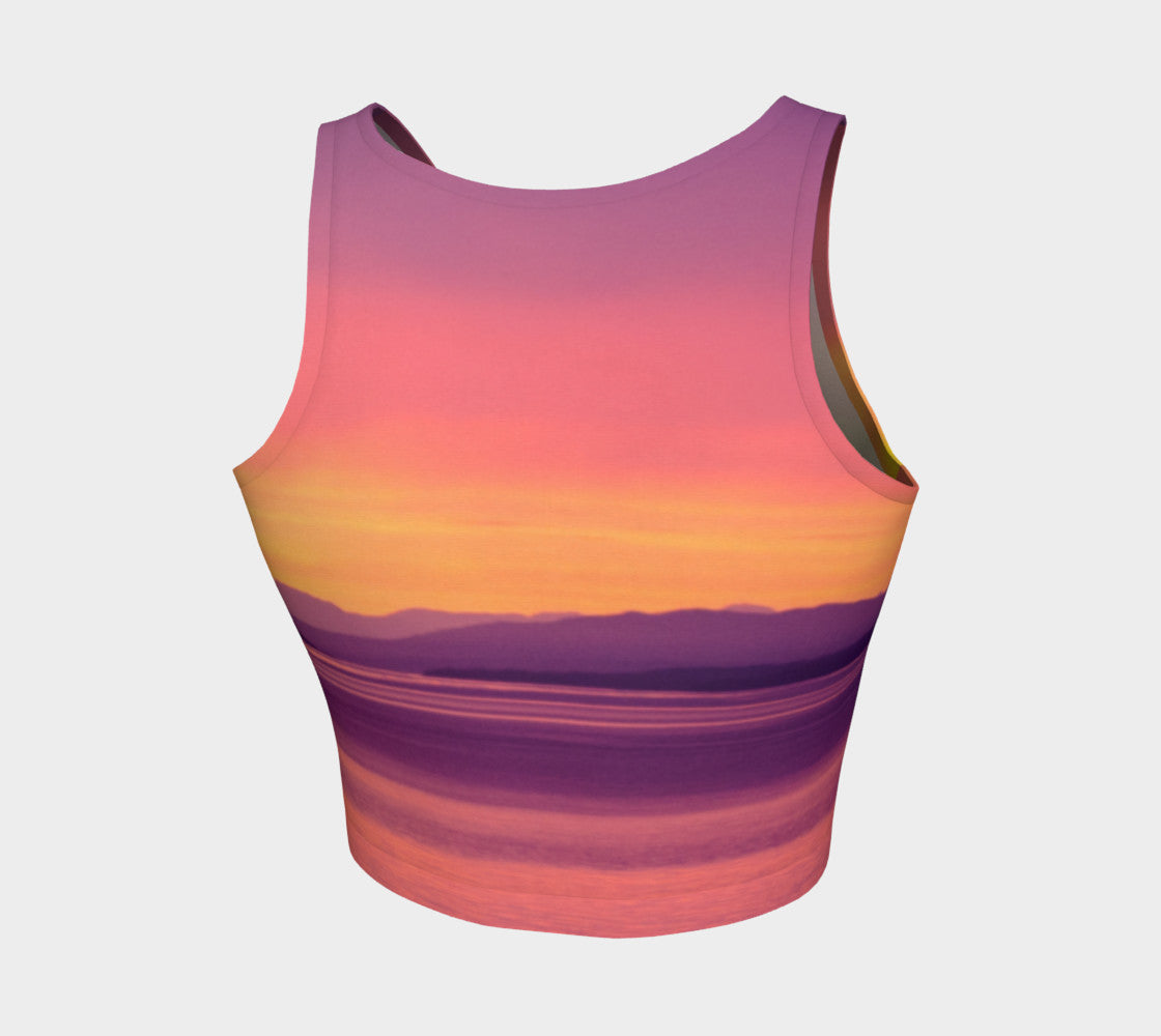 Vancouver Island Sunset Athletic Crop Top  Vancouver Island Sunset artwork by Roxy Hurtubise  Made to move with you!  Wear for your daily workouts, yoga, beach volleyball or as a bathing suit top!  Your Van Isle Goddess athletic crop top pairs up with our yoga or classic leggings and capris. Crop tops also look great with shorts, mini shorts, skirts fitted or flared.