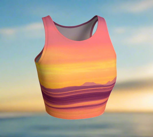 Vancouver Island Sunset Athletic Crop Top  Vancouver Island Sunset artwork by Roxy Hurtubise  Made to move with you!  Wear for your daily workouts, yoga, beach volleyball or as a bathing suit top!  Your Van Isle Goddess athletic crop top pairs up with our yoga or classic leggings and capris. Crop tops also look great with shorts, mini shorts, skirts fitted or flared.