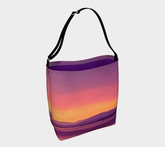 Vancouver Island Sunset Day Tote  Everyday Day Tote for Everything!  Van Isle Goddess ultimate tote bag!   Adjustable strap for comfort, the tote is made from soft and supple neoprene that stretches to fit whatever you can put in it!    Vibrant artwork that will never fade with washing.  Vancouver Island Sunset Artwork by  Roxy Hurtubise with purple interior.