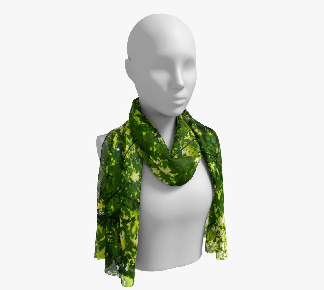 Canopy of Leaves Long Scarf  Wear as a scarf, shawl or as a head wrap.  Use for home decor as a wall hanging, also makes fabulous Wedding Party Gifts!    Artwork printed on 100% polyester lightweight fabric.    Choose from three different fabrics polychiffon, satin charmeuse and matte crepe.    Machined baby rolled edge hem finish.  Choose from 2 sizes:    10" x 45"    16" x 72" by vanislegoddess.com